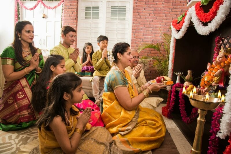 Hindu family praying