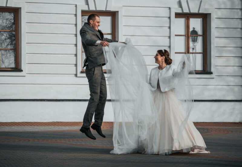 Bride and jumping groom