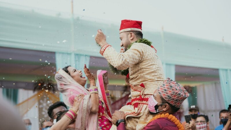 Hindu couple partying at a wedding