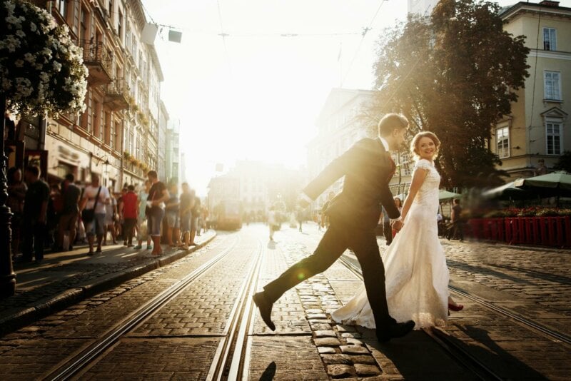 Married couple crossing the street