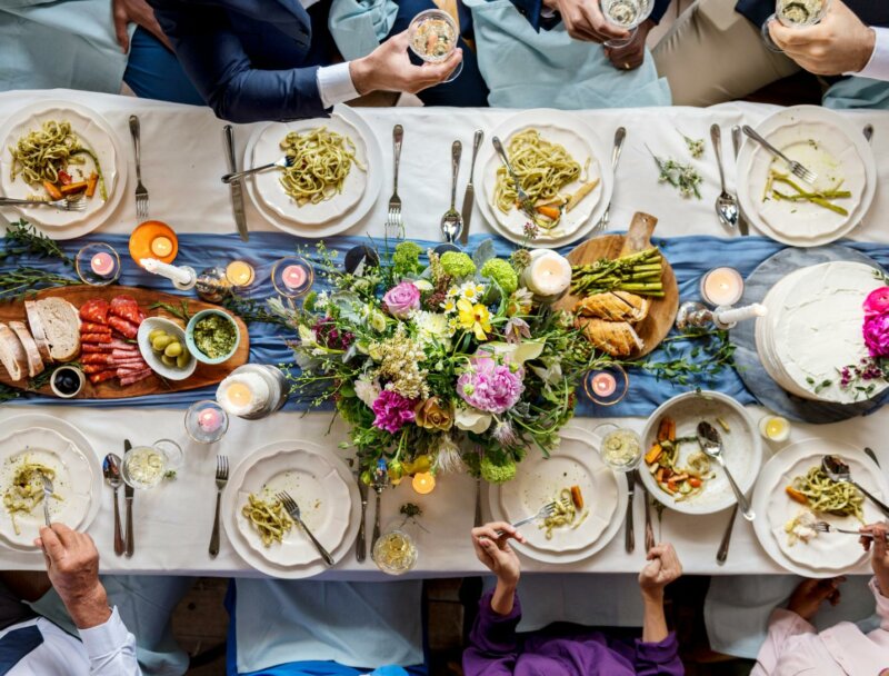 Wedding table with plates and flowers