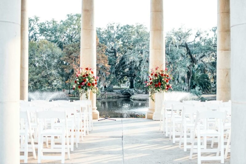 Wedding venue with white chairs and columns
