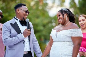 Couple exchanging vows and laughing