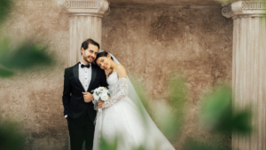 Aesthetic shot of a bride and groom posed at their wedding
