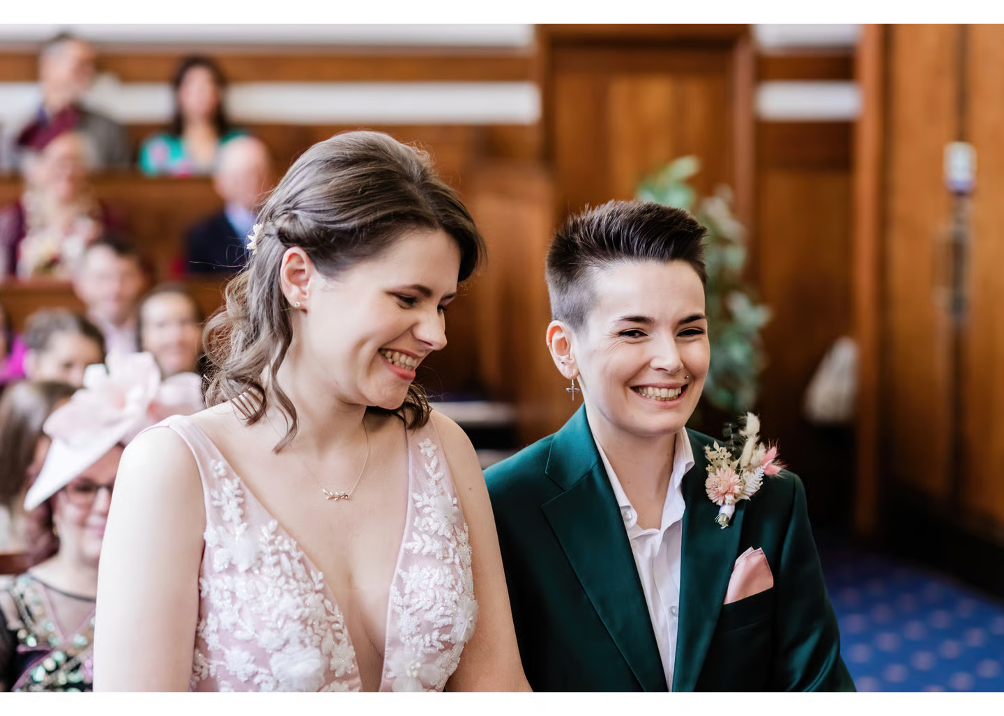 Happy couple smiling during their wedding ceremony