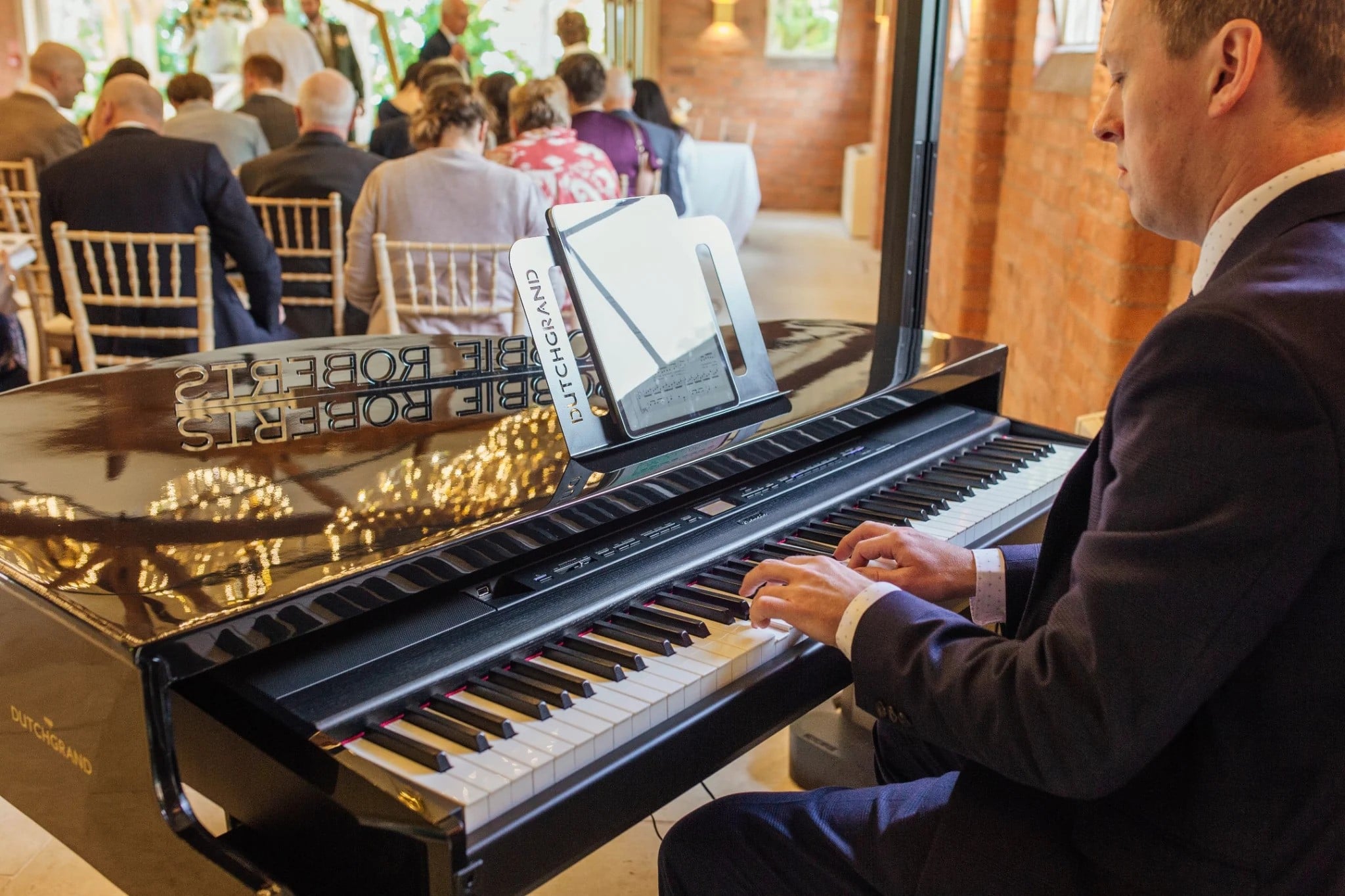 Wedding pianist playing during a ceremony