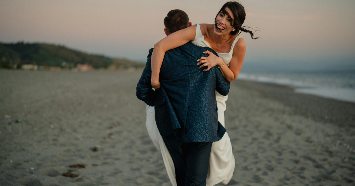bride and groom on beach