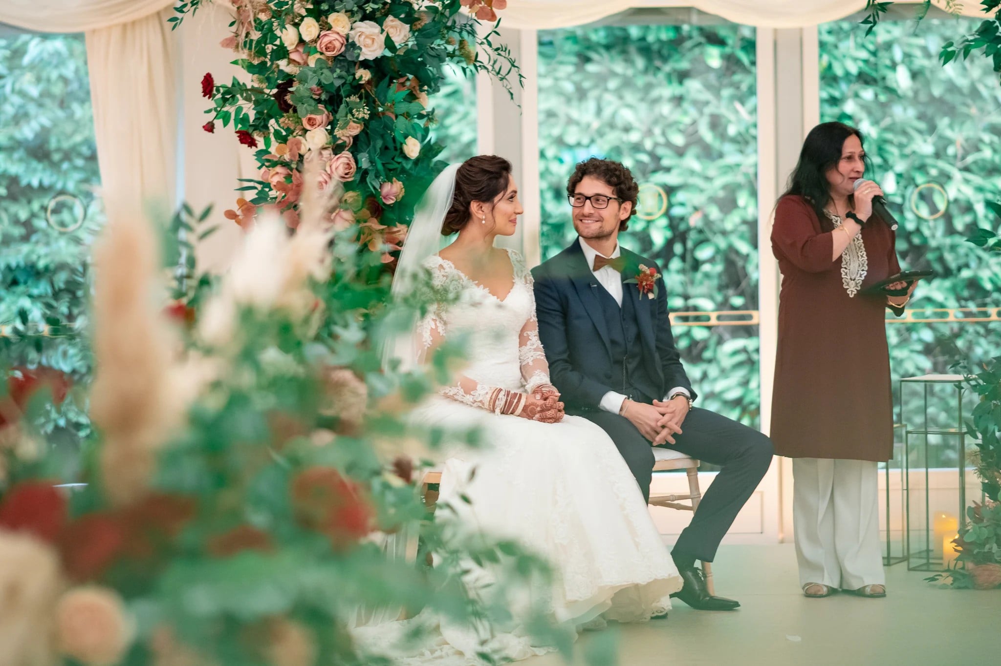 South asian wedding celebrant hosting a mixed-faith wedding