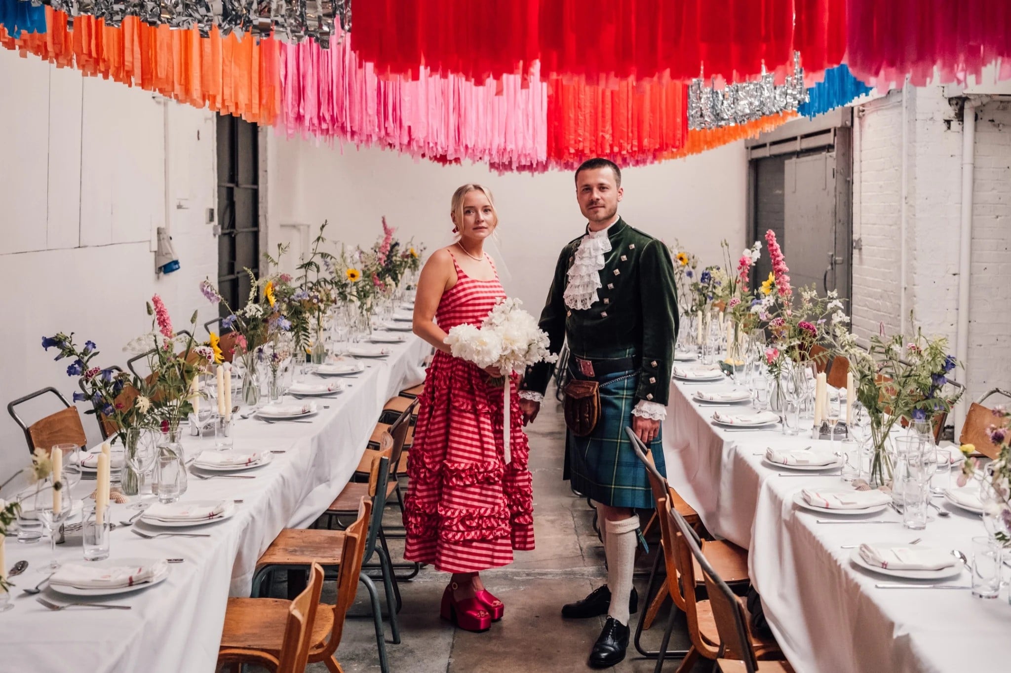 gen z wedding couple wearing cool coordinated wedding outfits