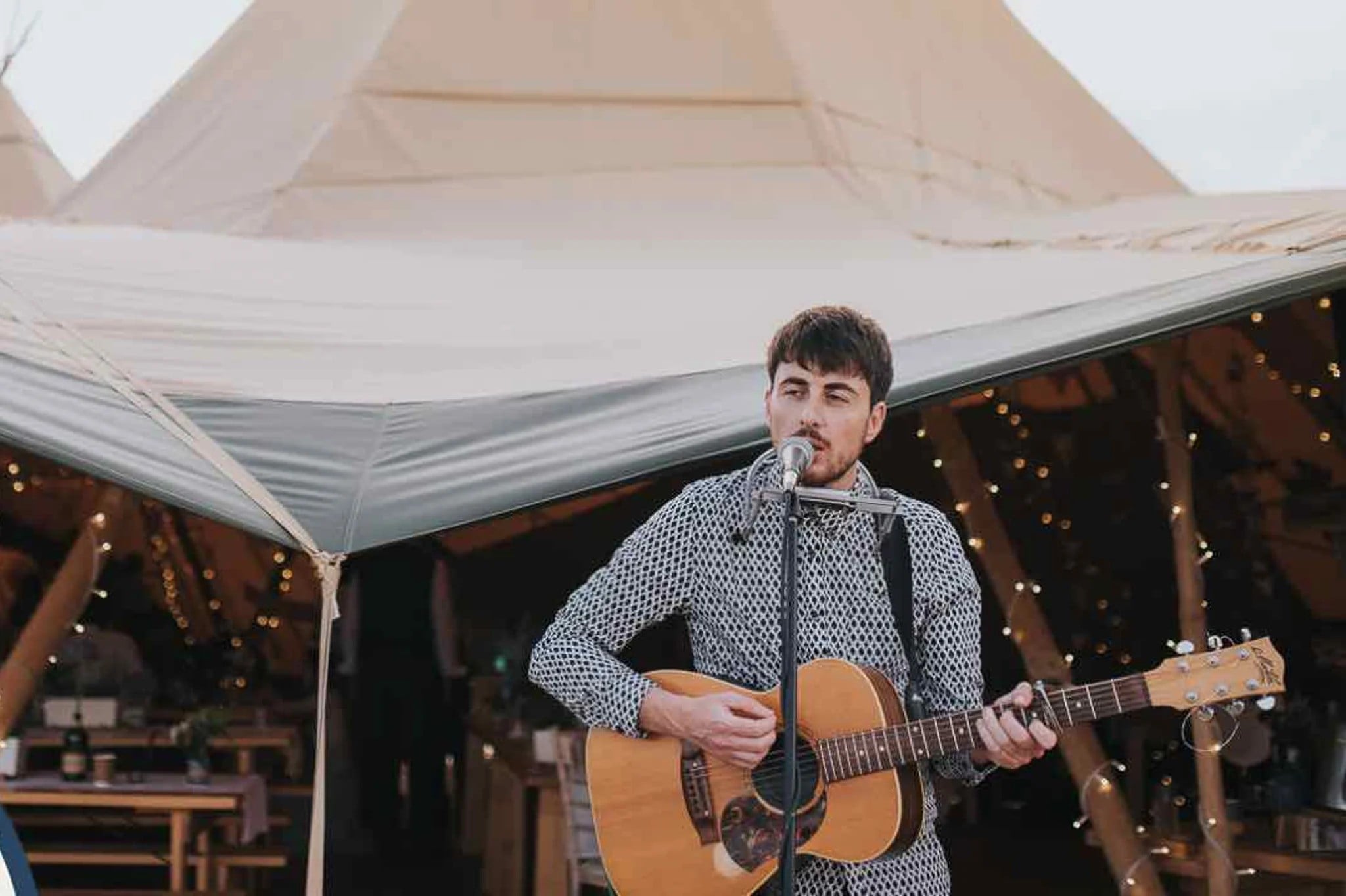 Acoustic singer songwriter performing at a wedding