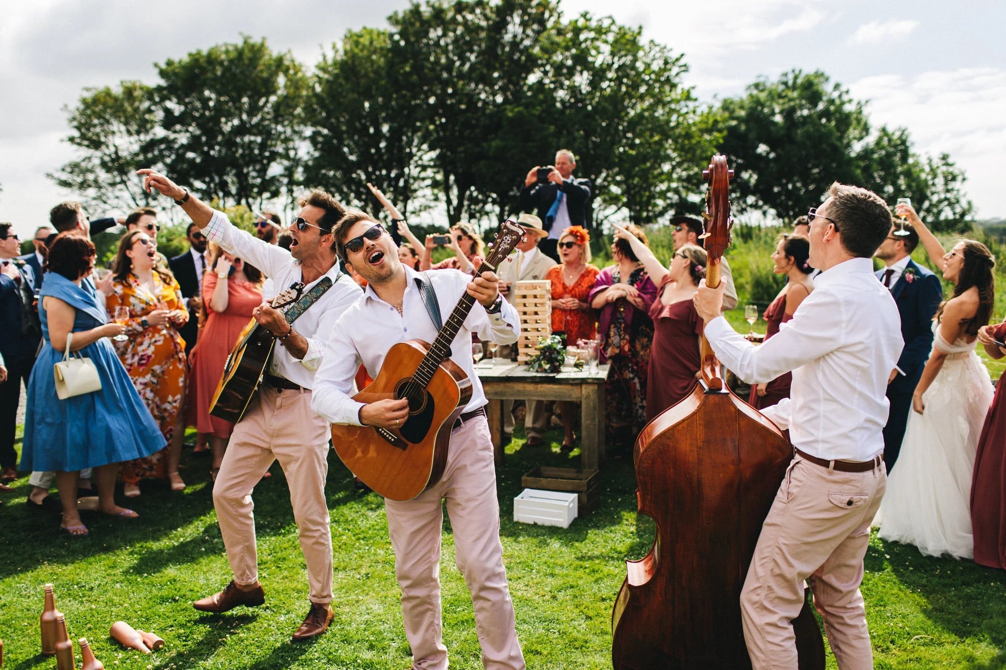 A wedding band playing outdoors