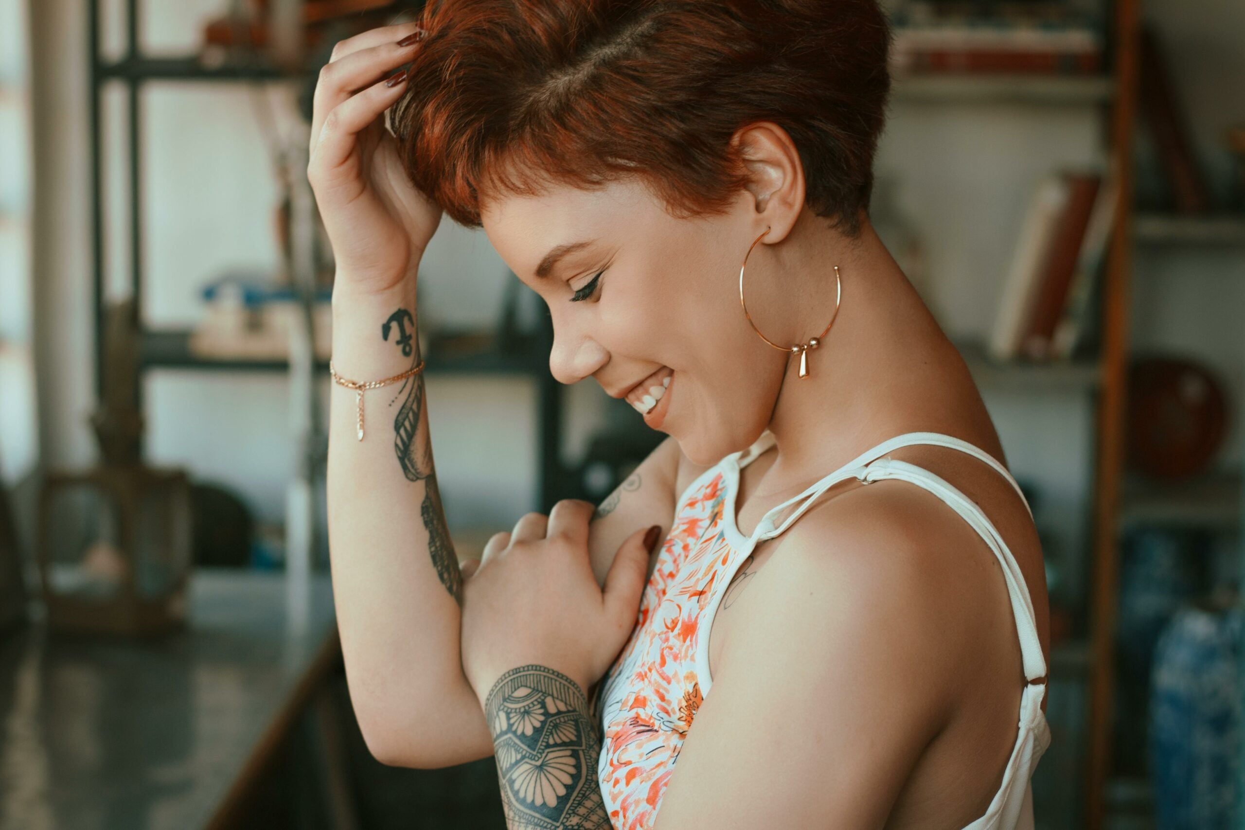 Woman with red pixie cut