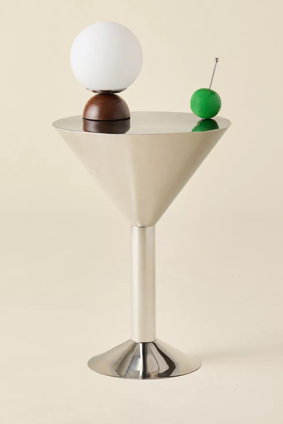 Silver side table in the shape of a martini