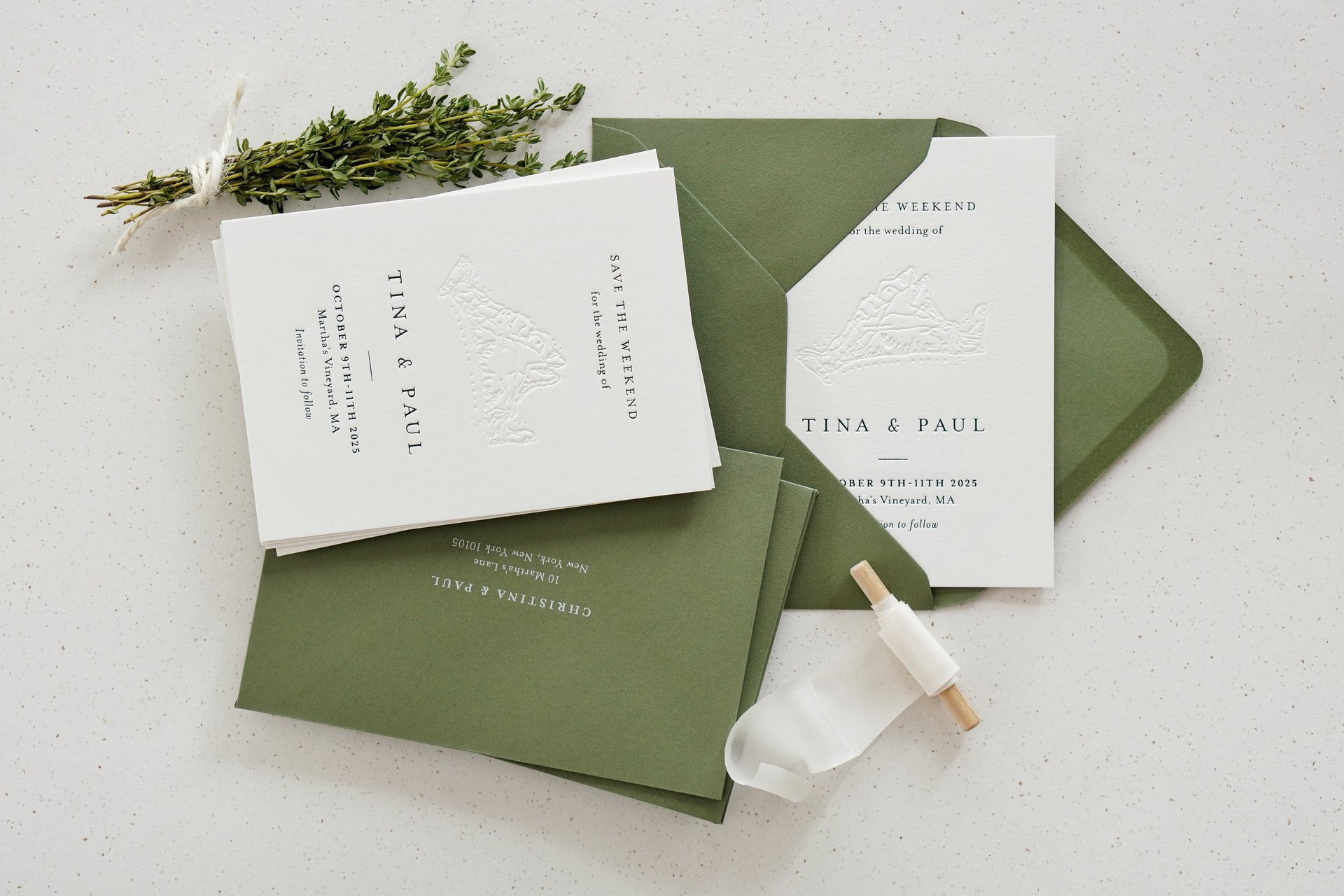 formal wedding invitations on white card with dark green envelopes