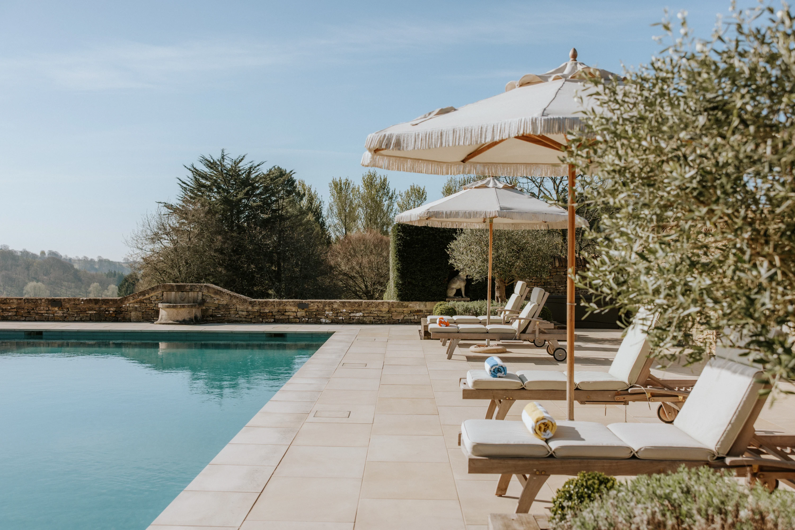 Coombe End Manor, a private Cotswold estate wedding venue near Cheltenham with year-round heated outdoor pool and spa