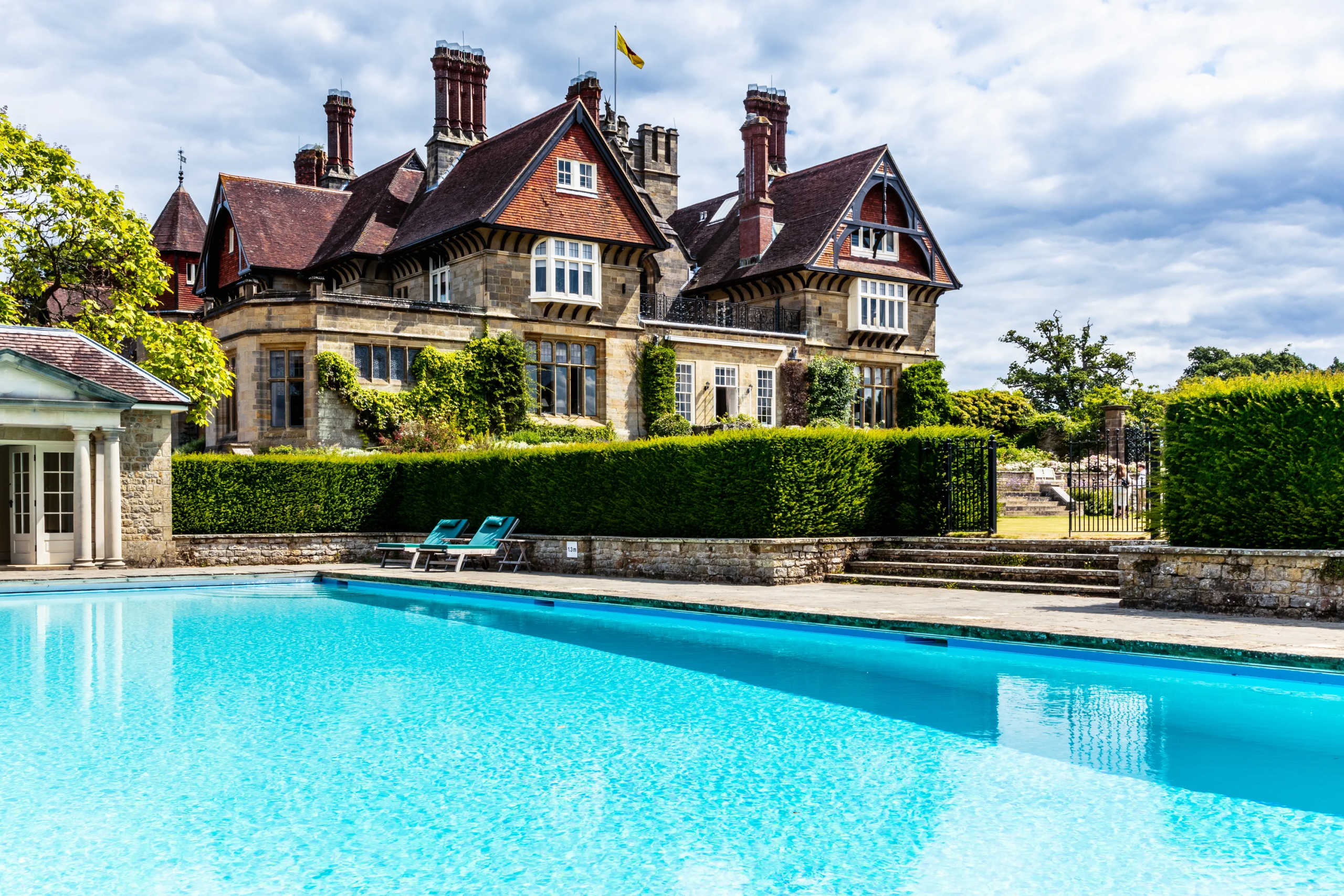 Outdoor swimming pool at Cowdray House, an exclusive-use wedding venue in the South Downs National Park