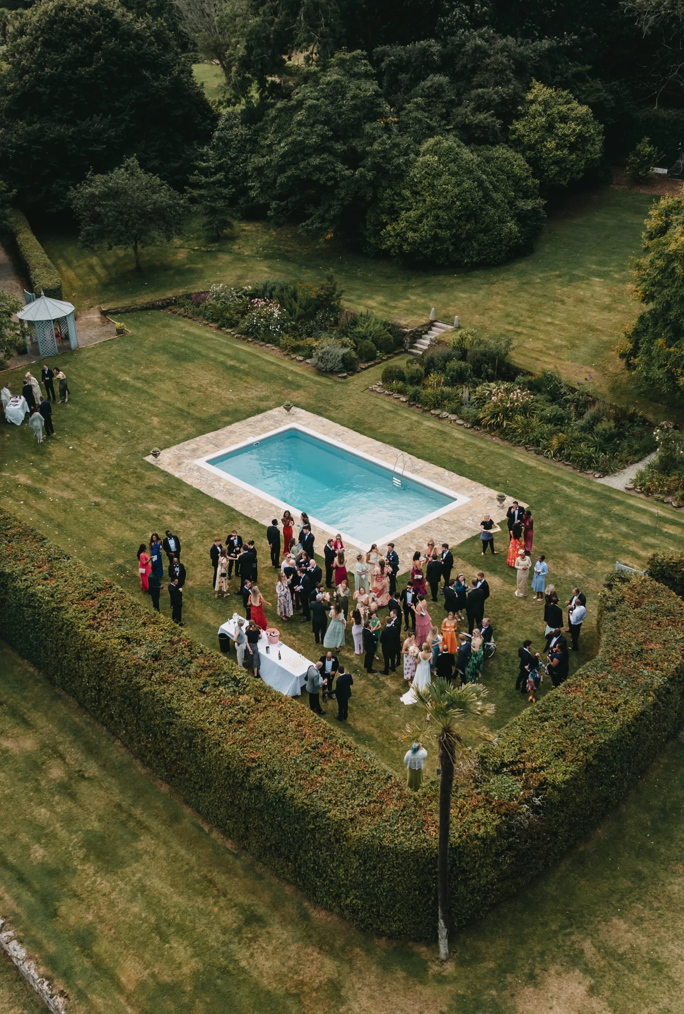 Scorrier House, a family-run Georgian country house wedding venue in Cornwall with walled pool garden and wood-fired sauna