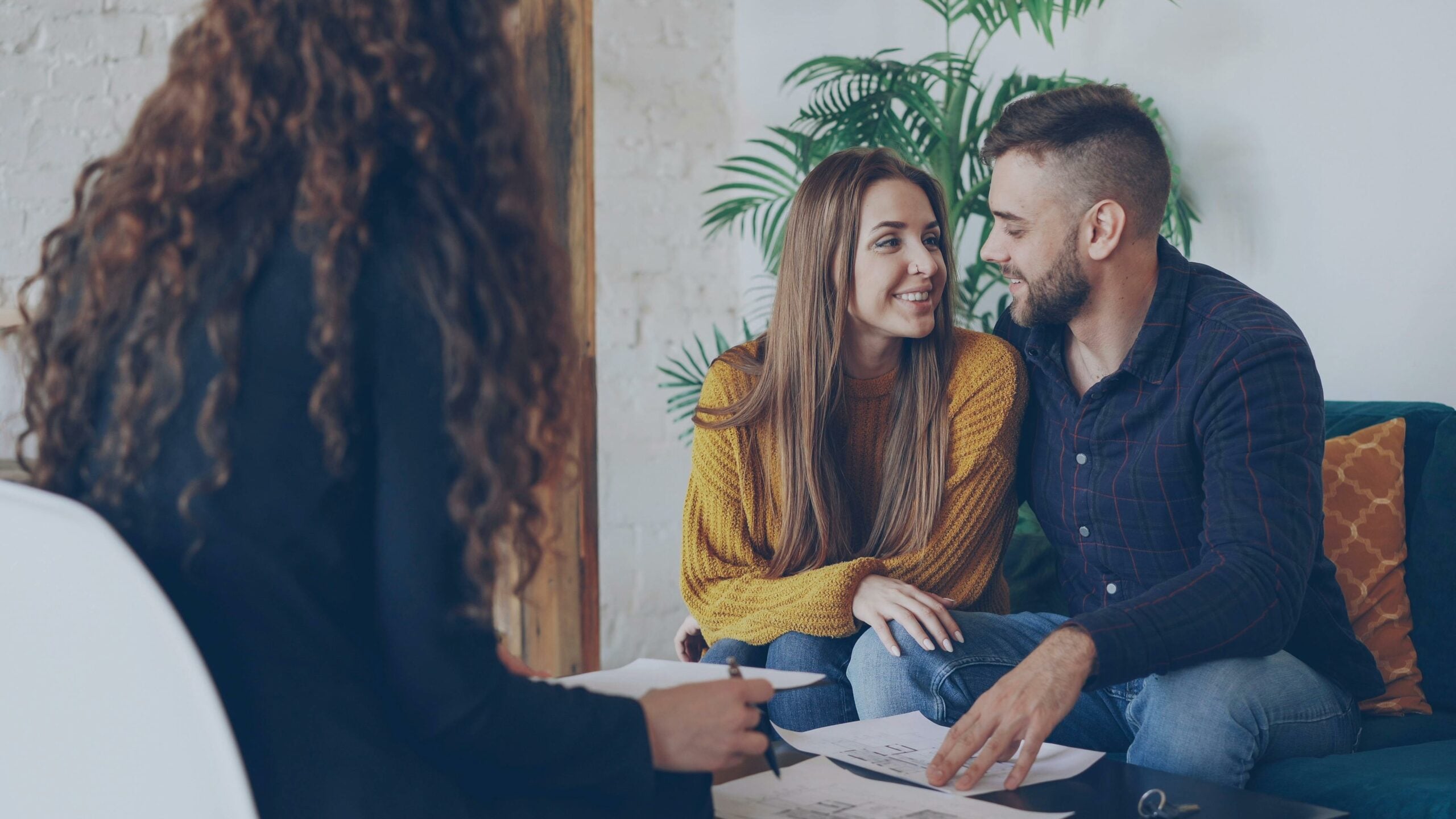 Newly married couple meeting with a lawyer